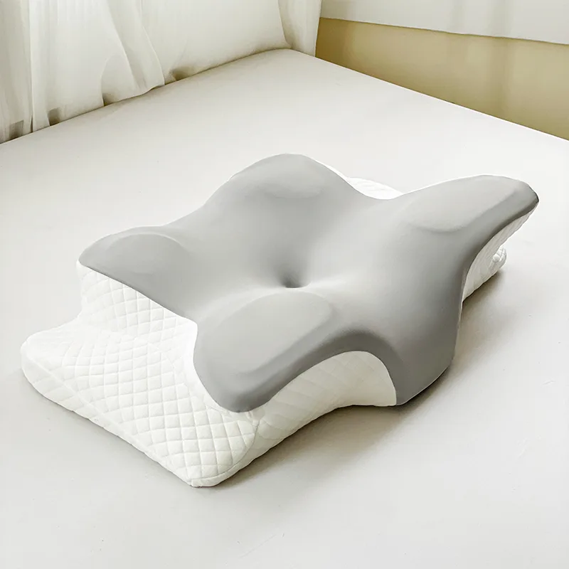 ergonomic-pillow-on-white-bed-linen