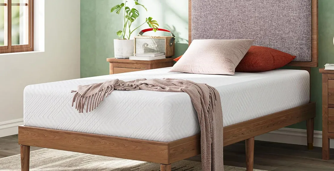 A white memory foam mattress in the bedroom