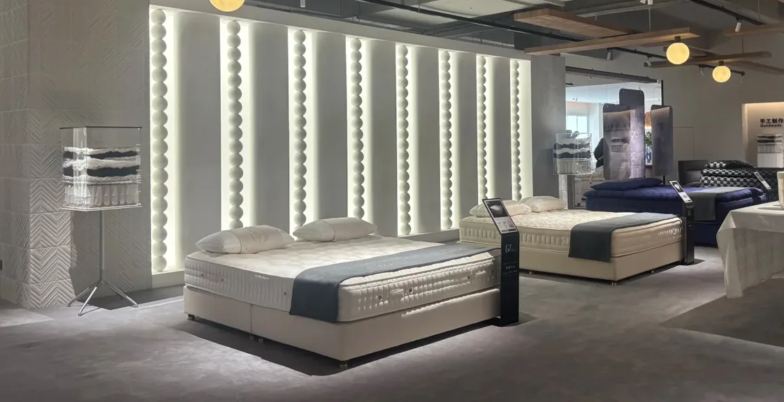 Mattresses displayed in showroom for bulk purchasing decisions