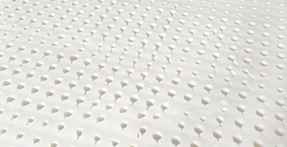 Natural latex mattress with breathable pinholes