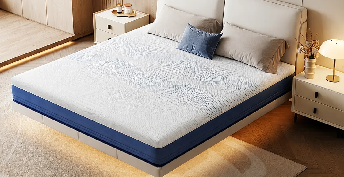 Neatly made bed with memory foam mattress in hotel room