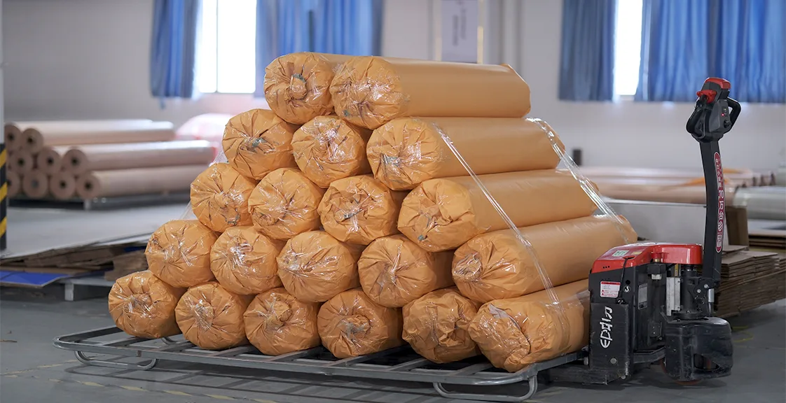 Rolled mattress packaging in factory for safe export shipping to Europe
